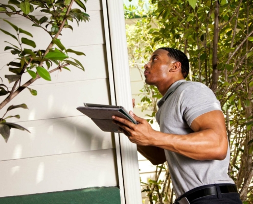 Inspector doing exterior walkaround